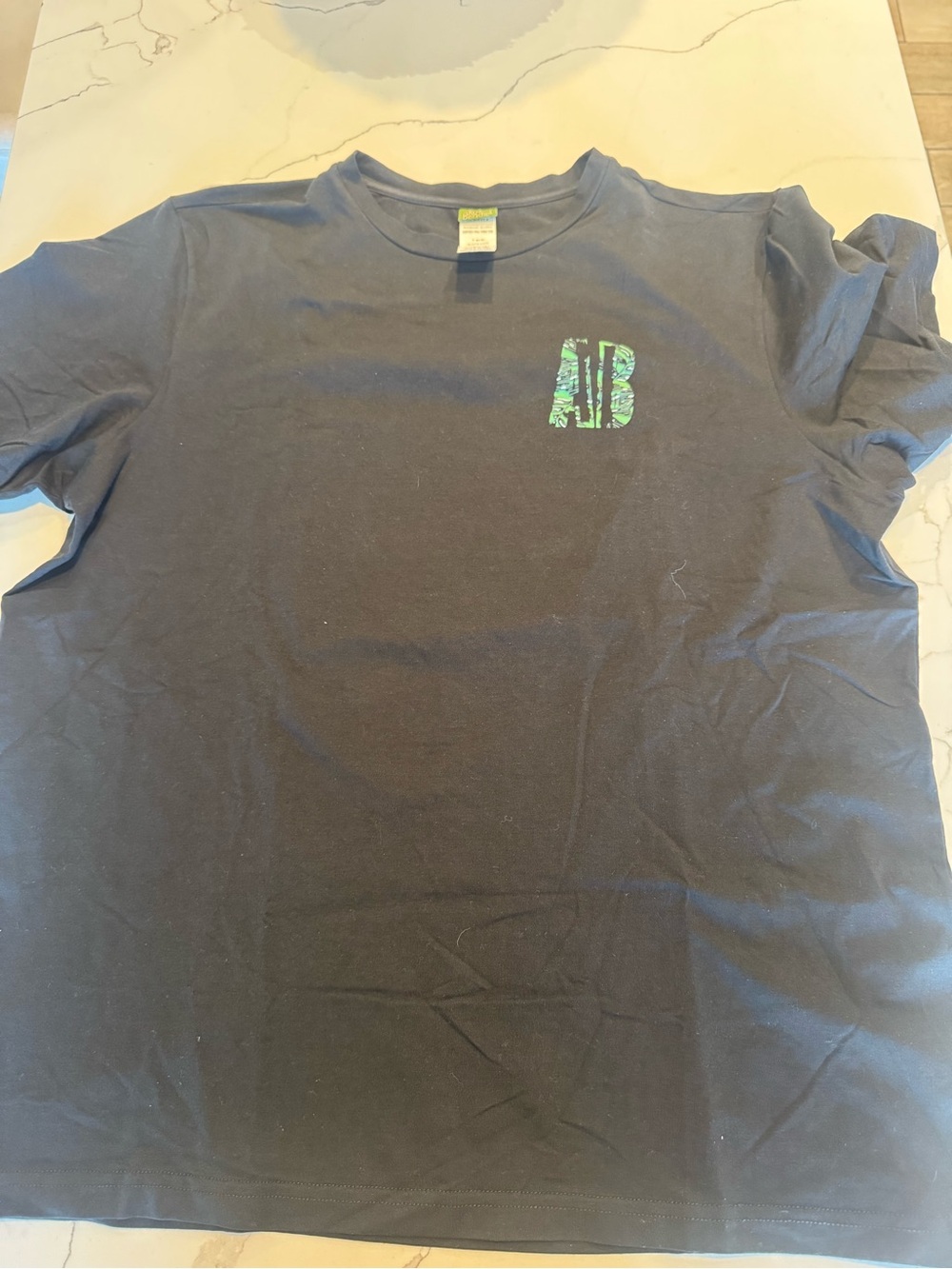 Agua Bendita Black Short-Sleeve Tee with Green Logo